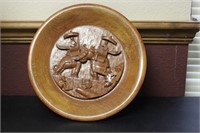 A Carved Wooden Plate