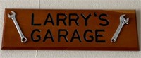 V - LARRY'S GARAGE PLAQUE (G30)