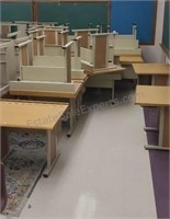All desks,chairs and tables in room 219. Buyer