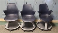 Swivel chairs with round underseat storage.