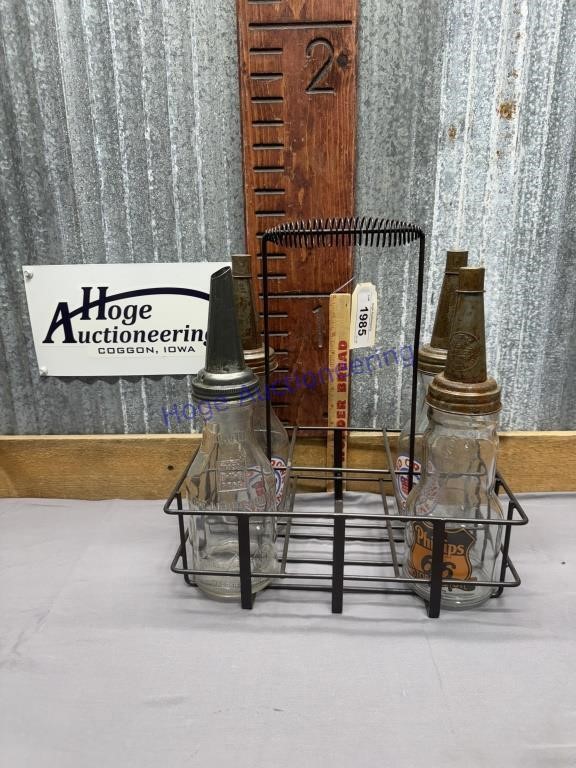 4 GLASS OIL BOTTLES & 1 WIRE BASKET- MONEY X 5