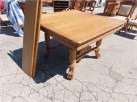 Antique Oak Dining table w/3 leaves, claw foot.