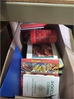 box of hardback books, cookbooks
