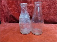 (2)Antique milk bottles.