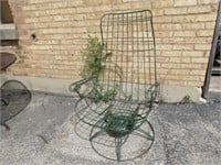 Vintage green patio rocking chair.