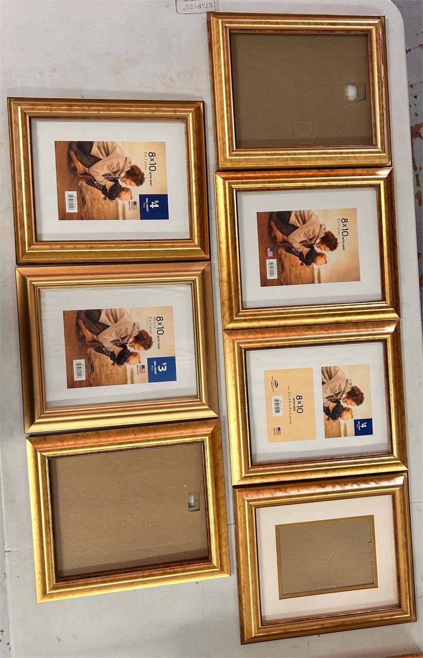Gold toned 7 piece 8x10 photo frame collection