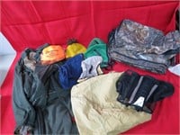 Assorted hunting clothes and hats lot.