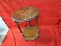 Small oval wood side table.