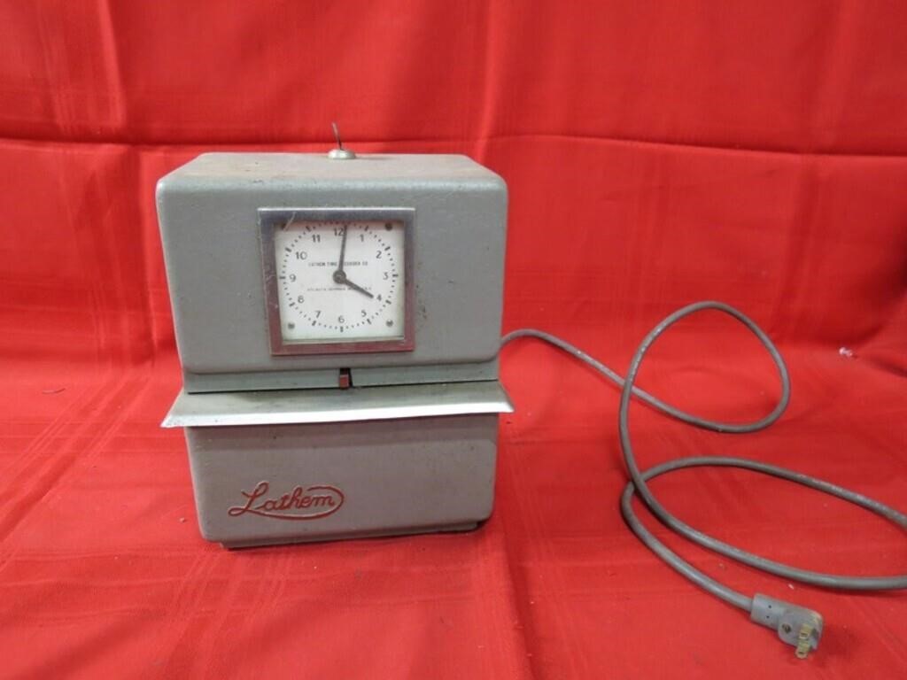 Vintage Latham industrial time clock.
