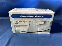 PROCTOR SILEX LIGHTWEIGHT IRON IN BOX