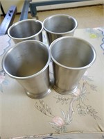 Group of 4 pewter cups