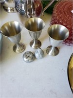 Pewter goblets and pewter fruit