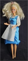 1966 Barbie Doll in blue dress and apron. Vintage