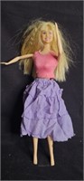 2007 vintage Barbie Doll w/ crimped hair.