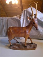 carved wood antelope