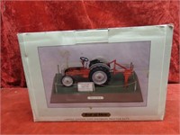 Spec cast 1/16 Ford 8N tractor bank w/box.