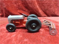Vintage Tootsie Toy w/disc Ford tractor toy.