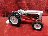 Franklin Mint 8N Ford tractor toy.