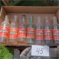 7 Moxie Soda Bottles- Good Logos