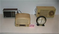 Group of old radios and a Big Ben alarm clock