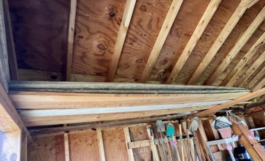 Wood in Rafter of Left Side of Shed