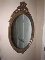carved wall mirror