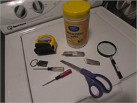 tape measure,knife,wipes,scissors & items
