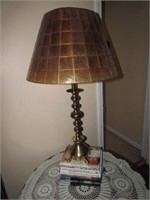 brass table lamp & books