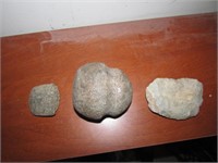 grooved axe artifact & rocks