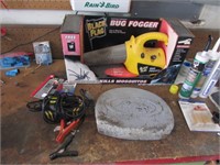 bug fogger,battery charger,caulking gun & items