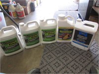 5 almost full jugs of driveway & deck cleaner