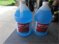 2 full jugs of windshield washer fluid