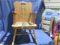 wooden rocking chair .
