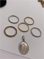 Sterling pendant and unmarked rings