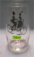 Early bicycle themed drinking glass