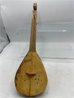 Small wooden mandolin