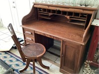 Antique roll-top desk with chair