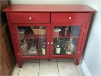 Red 2-door 2-drawer cabinet, contents not included