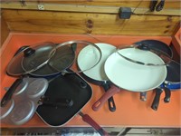 Collection of pans with lids