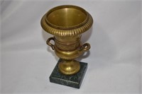 A Bronze Urn on an Onyx Base
