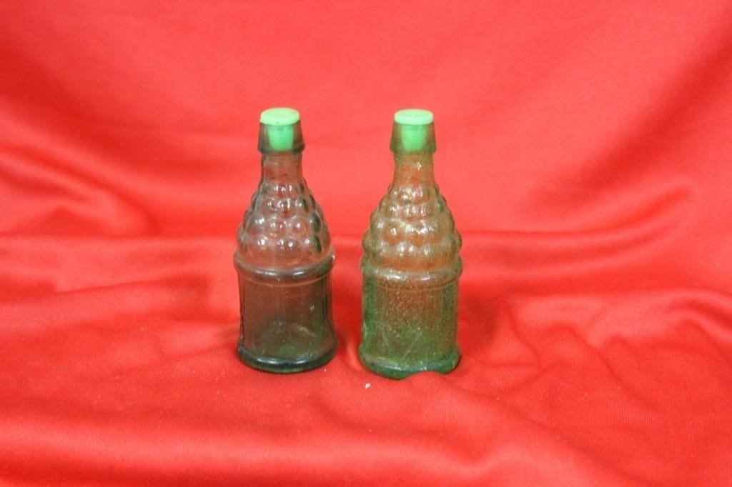 A Pair Of Glass Salt And Pepper Shaker