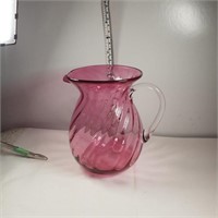 Cranberry glass pitcher