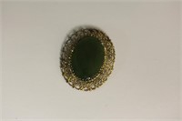 A Jade and Sterling Brooch