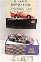 (2) ACTION DIE-CAST REPLICA RACE CARS IN BOXES
