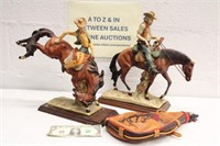 2 COWBOY STATUES ON WOOD BASES & WATER BAG