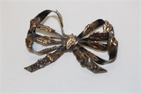A Sterling Bow Brooch