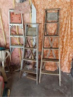 4 ladders, 3 wood, 1 aluminum