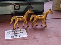 Brass horses