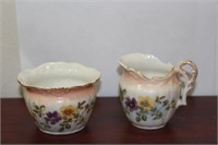 A Pair of Cream and Sugar Containers