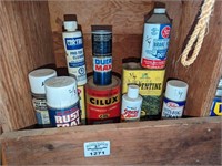 Assorted paints and garage fluids